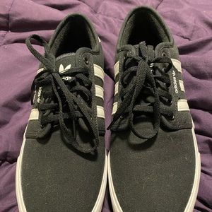 Never used brand new adidas seeley size 11.5 in men black with white strips